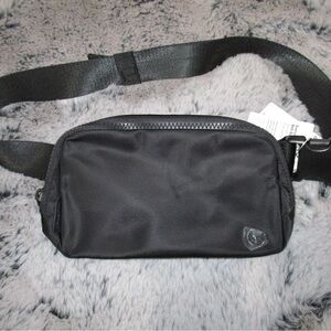 Brand new lululemon black belt bag with tags!